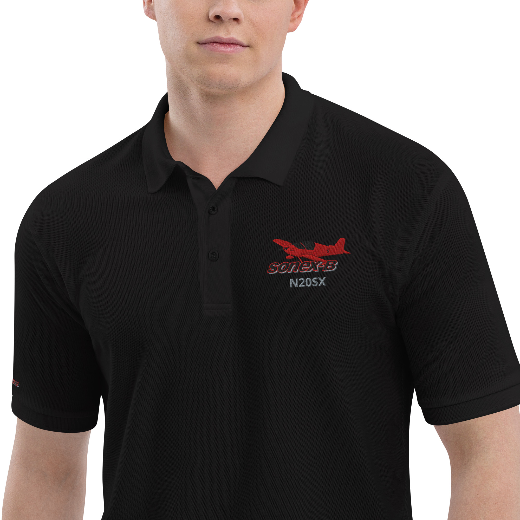 premium-polo-shirt-black-zoomed-in-681f5e9c1cb35.jpg