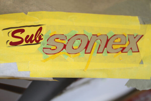 The SubSonex logo being airbrushed on Paul Dye's aircraft.