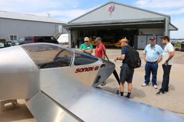 Attendees check-out the Sonex B-Model trio-gear during the Open House.